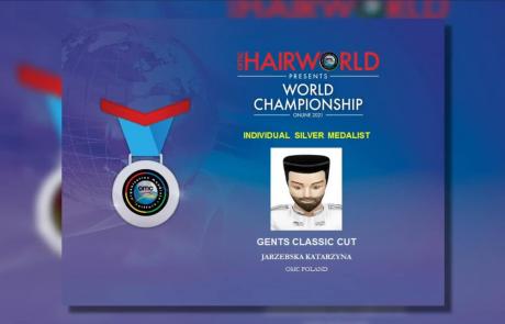 dyplom z rysunkami medalu i twarzy mężczyzny oraz napisami: OMC HAIRWORLD PRESENTS WORLD CHAMPIONSHIP ONLINE 2021 INDIVIDUAL SILVER MEDALIST GENTS CLASSIC CUT JARZEBSKA KATARZYNA OMC POLAND